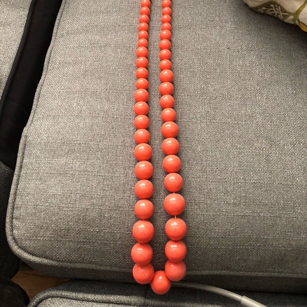 Long coral bead necklace